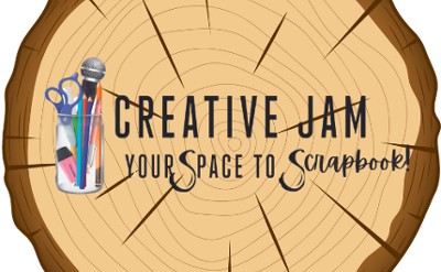 A slice of a tree with the logo for the Creative Jam