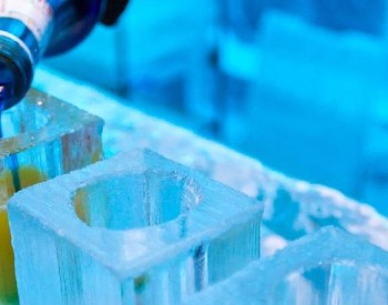 drink being pourced in ice at ice bar