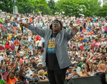 performer on an outdoor stage