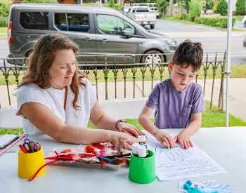 Families enjoy making art together.