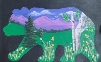 Bear silhouette shape with a mountain scene with flowers and birch tree inside the shape