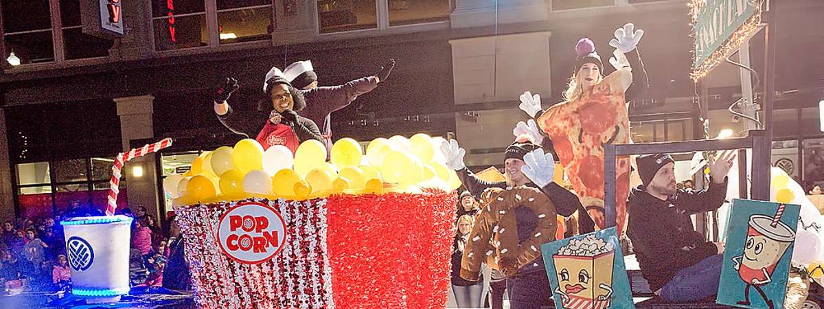 float with giant popcorn in parade
