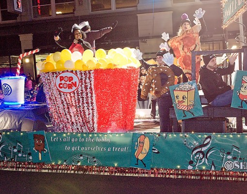 float with giant popcorn in parade