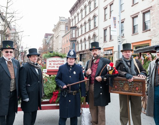 group of men dressed in Victorian period attire