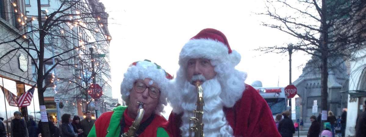saxophone Santa and an elf