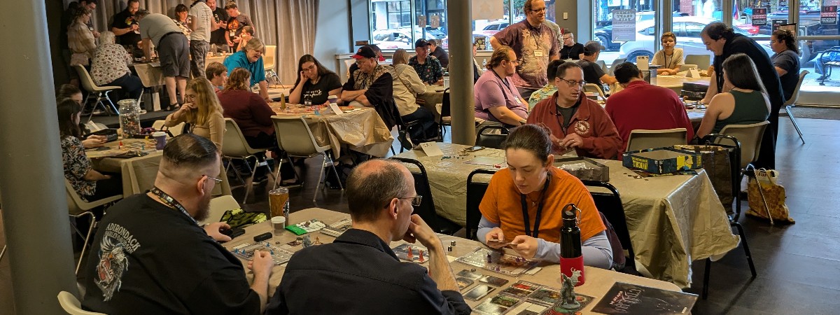 Gamers playing in the board game area
