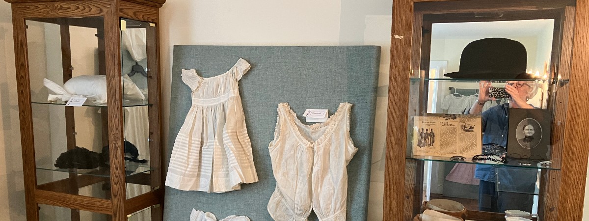 Garments and accessories on display at Parks-Bentley Place's historic house.