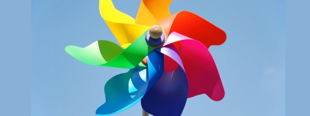 A colorful pinwheel against the sky.