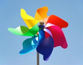 A colorful pinwheel against the sky.