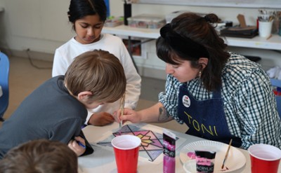 Students watch a demonstration by Hyde Educator. 