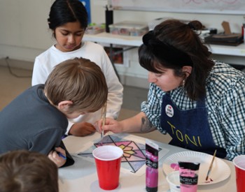 Students watch a demonstration by Hyde Educator.