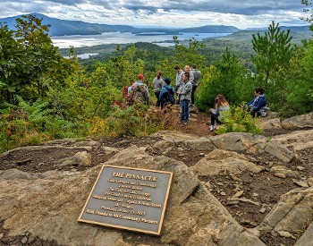 people at summit of the pinnacle