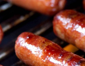 hot dogs on grill