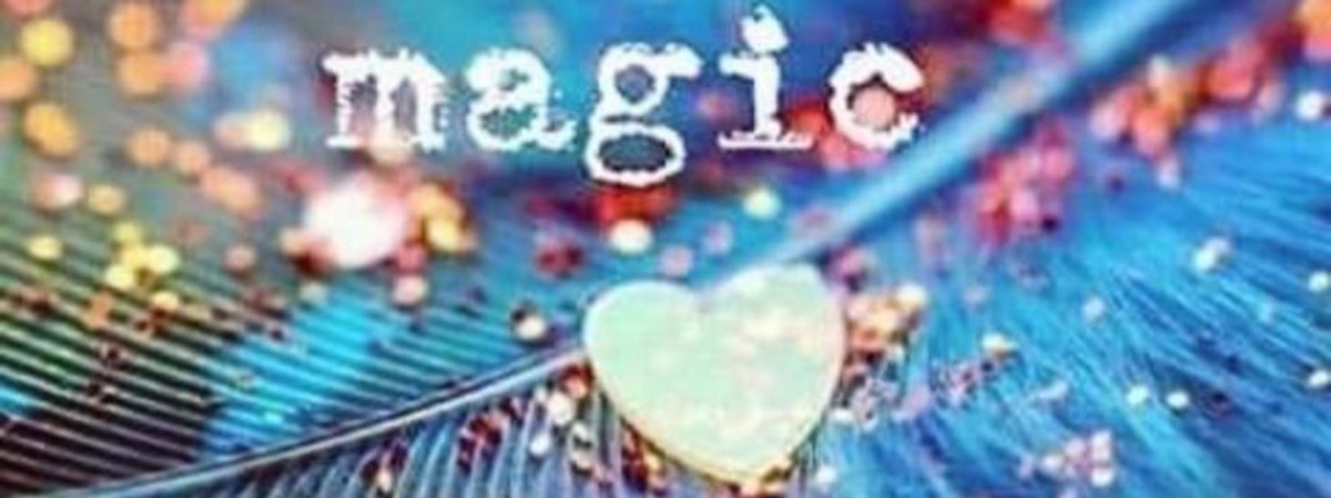 background of a blue feather, with glitter and the words "Believe in your own magic"