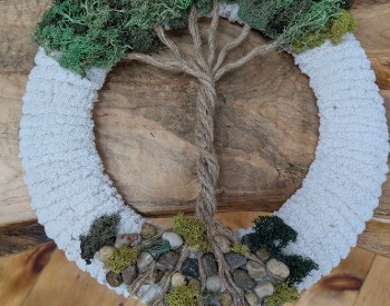 Wreath made of yarn, moss, twine and rocks