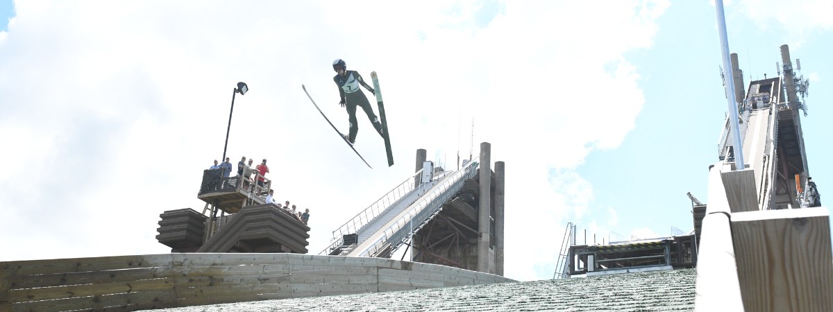 Ski Jumper soars into the air off the big jump.