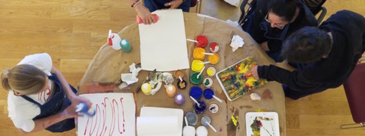 Adults creating artwork