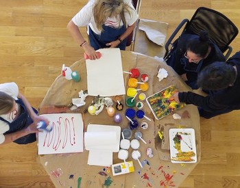 Adults creating artwork