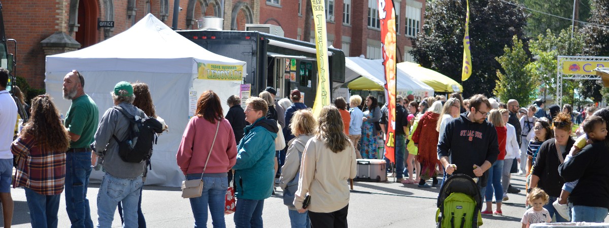Attendees browsing artist booths