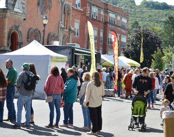 Attendees browsing artist booths