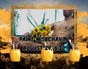 A man reclining holding sunflowers