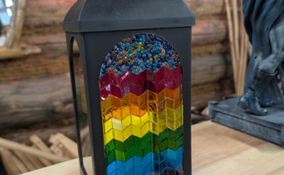 Black lantern with rainbow chevron tiles