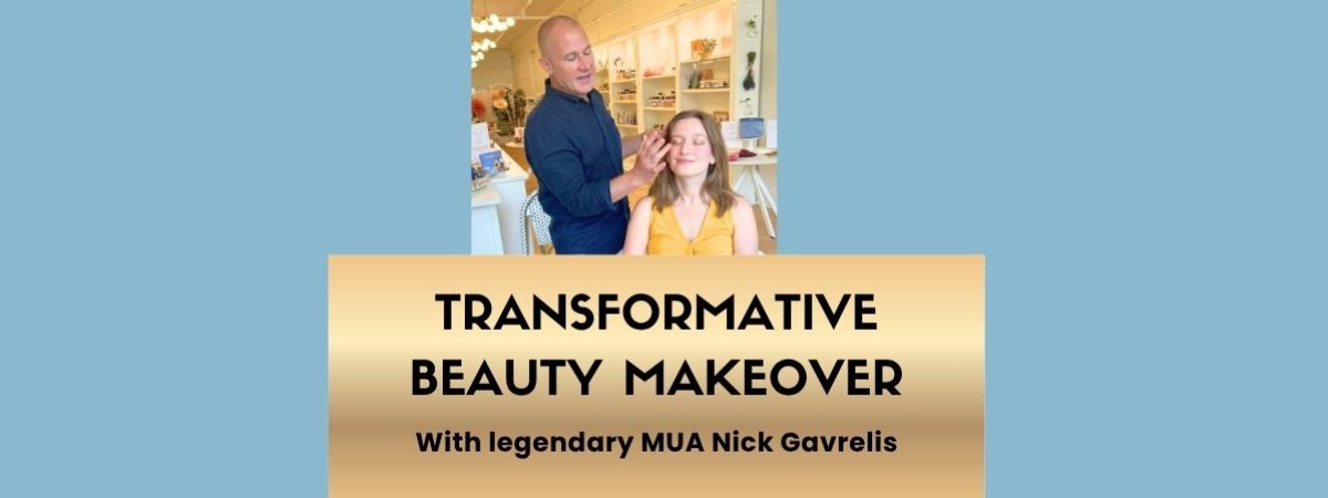 A photo of a man putting makeup on a woman