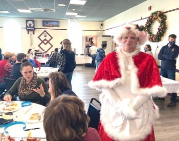 Mrs. Claus keeps everyone on the up and up!