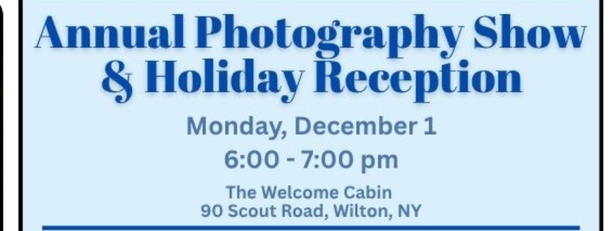 Dark blue words on light blue background reading "Annual Photography Show & Holiday Reception Monday, December 1 6:00 - 7:00 PM The Welcome Cabin 90 Scout Road, Wilton, NY"