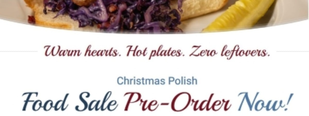 image of kielbasi on a role with red cabbage and mustard with a pickle and the words warm hearts, hot plates, zero leftovers. Christmas Polish Food sale - pre-order now! TIs the season to stock the freezer and the dinner table.