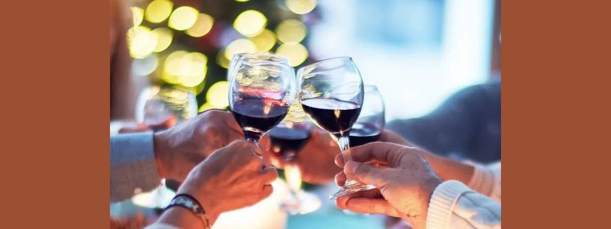 four glasses of red wine cheers