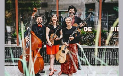 music group poses with instruments