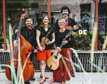 music group poses with instruments