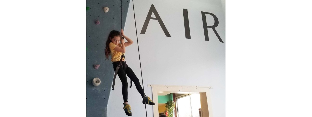 girl on a climbing rope