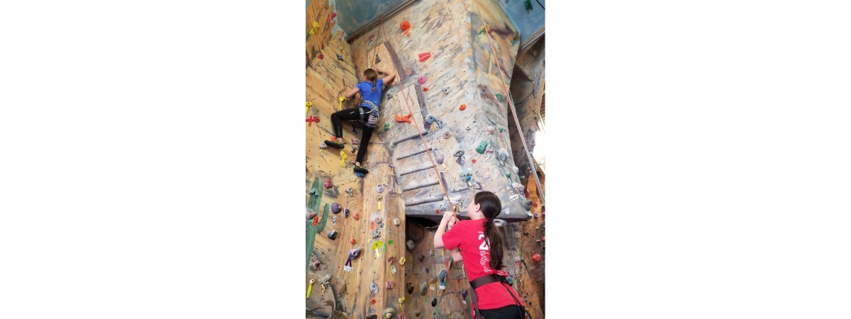two people rock climbing