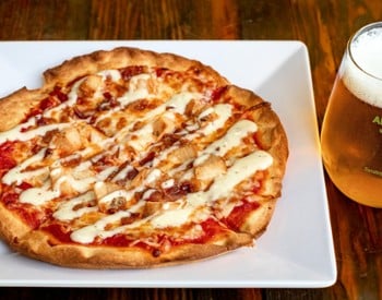 Pizza and draft beer special at Nature&rsquo;s Edge Bistro restaurant in Saratoga Springs