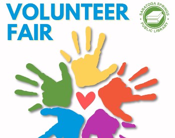Text says Volunteer Fair with a circle of rainbow hands below