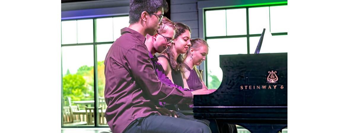 musicians at piano
