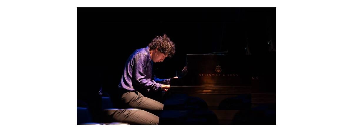 man at piano