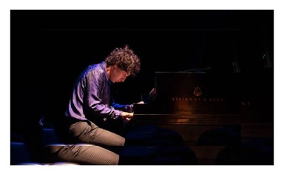 man at piano