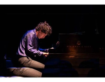 man at piano