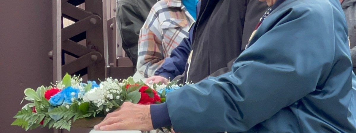 men with wreath