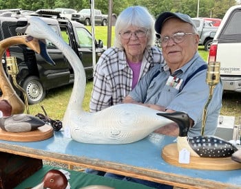Local artisans display wooden duck decoys
