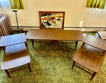 Coffee table with matching end tables.