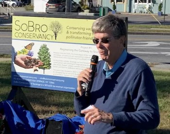 Tom Denny at the SoBro Triangle marking another milestone in the development of the SoBro Conservancy