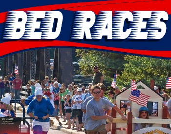 Competitors race bedframes across an old bridge
