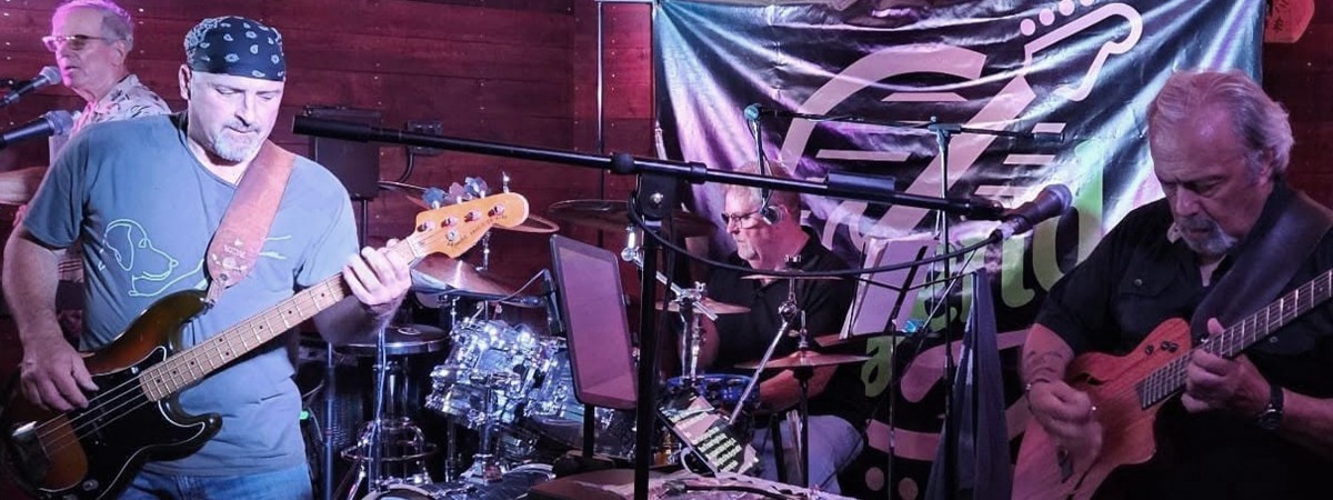 A band sings and plays