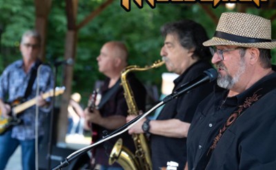 A band sings and plays