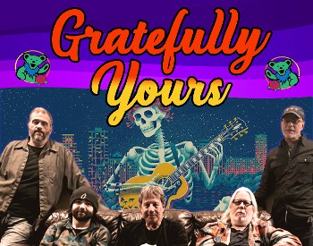 A band poses for a photo in front of a Grateful Dead mural
