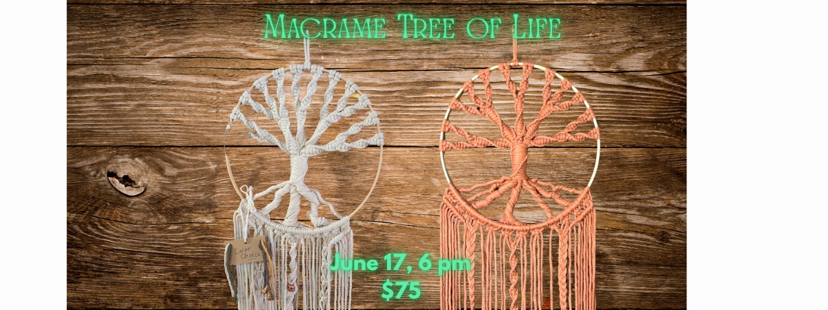 Two macrame wall hangings shaped like trees on a wood background